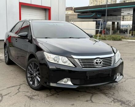 Красный Тойота Камри, объемом двигателя 2.5 л и пробегом 175 тыс. км за 13700 $, фото 1 на Automoto.ua