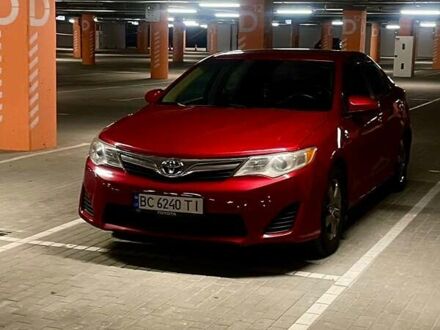 Красный Тойота Камри, объемом двигателя 2.49 л и пробегом 283 тыс. км за 8600 $, фото 1 на Automoto.ua