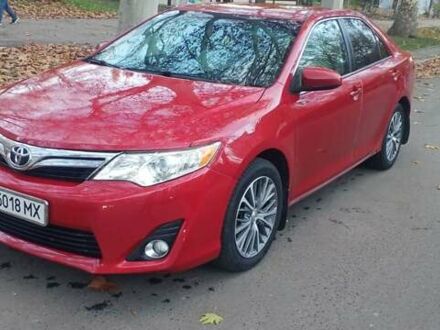 Красный Тойота Камри, объемом двигателя 2.49 л и пробегом 188 тыс. км за 11500 $, фото 1 на Automoto.ua