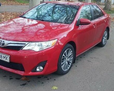 Красный Тойота Камри, объемом двигателя 2.49 л и пробегом 188 тыс. км за 11500 $, фото 1 на Automoto.ua
