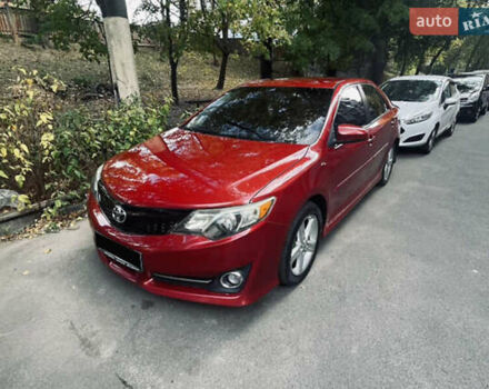 Красный Тойота Камри, объемом двигателя 2.49 л и пробегом 255 тыс. км за 10800 $, фото 1 на Automoto.ua