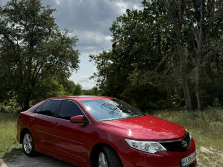 Красный Тойота Камри, объемом двигателя 2.49 л и пробегом 161 тыс. км за 13500 $, фото 1 на Automoto.ua
