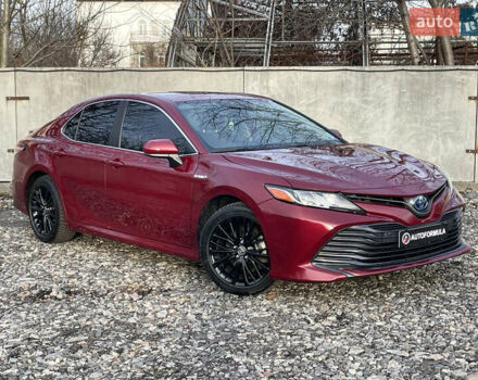 Красный Тойота Камри, объемом двигателя 2.49 л и пробегом 46 тыс. км за 23990 $, фото 1 на Automoto.ua