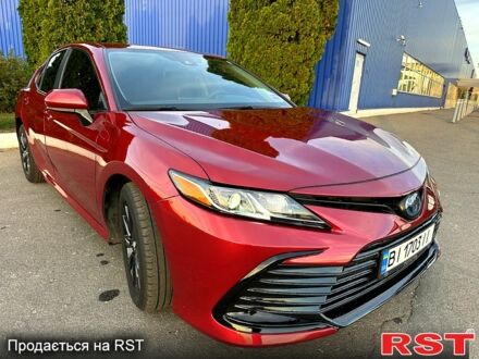 Красный Тойота Камри, объемом двигателя 2.5 л и пробегом 57 тыс. км за 30500 $, фото 1 на Automoto.ua