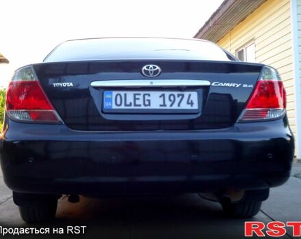 Тойота Камри, объемом двигателя 2.4 л и пробегом 300 тыс. км за 7500 $, фото 1 на Automoto.ua