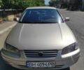 Желтый Тойота Камри, объемом двигателя 3 л и пробегом 354 тыс. км за 3200 $, фото 1 на Automoto.ua
