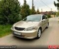 Жовтий Тойота Камрі, об'ємом двигуна 2.4 л та пробігом 318 тис. км за 5400 $, фото 1 на Automoto.ua