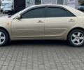 Желтый Тойота Камри, объемом двигателя 2.4 л и пробегом 1000 тыс. км за 6700 $, фото 1 на Automoto.ua