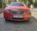 Желтый Тойота Камри, объемом двигателя 2.4 л и пробегом 373 тыс. км за 7000 $, фото 1 на Automoto.ua