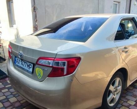 Желтый Тойота Камри, объемом двигателя 2.5 л и пробегом 250 тыс. км за 9000 $, фото 2 на Automoto.ua