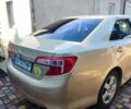 Желтый Тойота Камри, объемом двигателя 2.5 л и пробегом 250 тыс. км за 9000 $, фото 2 на Automoto.ua