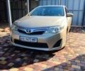 Желтый Тойота Камри, объемом двигателя 2.5 л и пробегом 250 тыс. км за 9000 $, фото 1 на Automoto.ua
