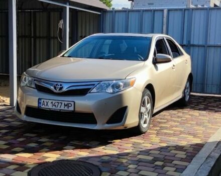 Желтый Тойота Камри, объемом двигателя 2.5 л и пробегом 250 тыс. км за 9000 $, фото 1 на Automoto.ua