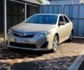 Желтый Тойота Камри, объемом двигателя 2.5 л и пробегом 250 тыс. км за 9000 $, фото 1 на Automoto.ua