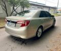 Желтый Тойота Камри, объемом двигателя 2.5 л и пробегом 305 тыс. км за 10000 $, фото 5 на Automoto.ua