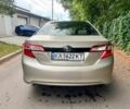 Желтый Тойота Камри, объемом двигателя 2.5 л и пробегом 305 тыс. км за 10000 $, фото 2 на Automoto.ua