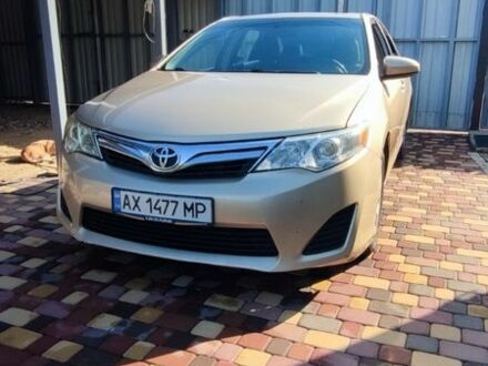 Жовтий Тойота Камрі, об'ємом двигуна 2.5 л та пробігом 250 тис. км за 9000 $, фото 1 на Automoto.ua