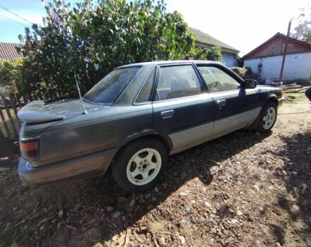 Серый Тойота Камри, объемом двигателя 1.8 л и пробегом 100 тыс. км за 360 $, фото 4 на Automoto.ua