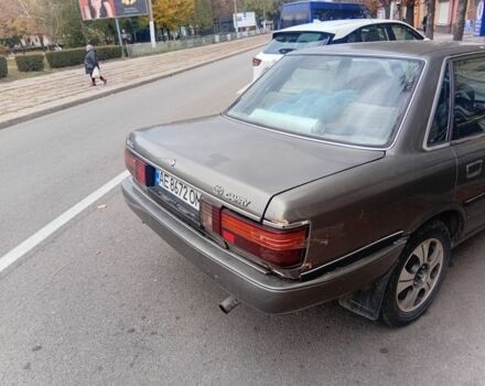 Серый Тойота Камри, объемом двигателя 2 л и пробегом 359 тыс. км за 1300 $, фото 3 на Automoto.ua