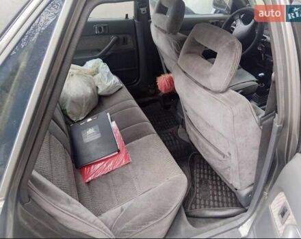 Сірий Тойота Камрі, об'ємом двигуна 2 л та пробігом 359 тис. км за 1399 $, фото 3 на Automoto.ua