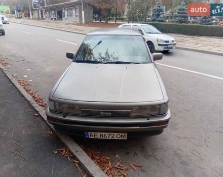 Сірий Тойота Камрі, об'ємом двигуна 2 л та пробігом 359 тис. км за 1399 $, фото 1 на Automoto.ua