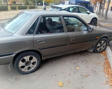 Серый Тойота Камри, объемом двигателя 2 л и пробегом 359 тыс. км за 1300 $, фото 2 на Automoto.ua