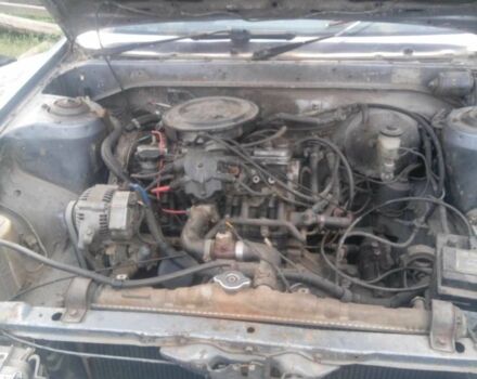 Серый Тойота Камри, объемом двигателя 2 л и пробегом 350 тыс. км за 550 $, фото 1 на Automoto.ua