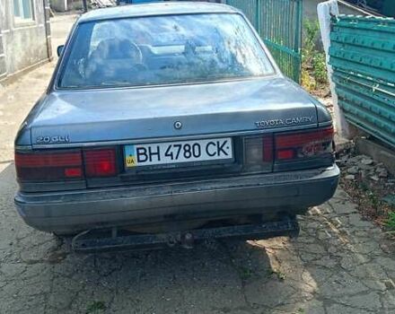 Серый Тойота Камри, объемом двигателя 2 л и пробегом 455 тыс. км за 450 $, фото 4 на Automoto.ua