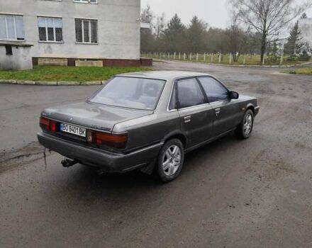 Серый Тойота Камри, объемом двигателя 2 л и пробегом 528 тыс. км за 950 $, фото 3 на Automoto.ua