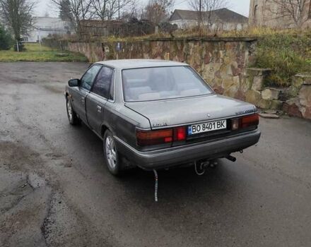 Серый Тойота Камри, объемом двигателя 2 л и пробегом 528 тыс. км за 950 $, фото 5 на Automoto.ua