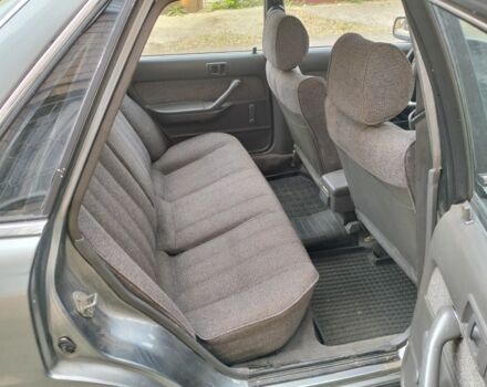 Серый Тойота Камри, объемом двигателя 2 л и пробегом 396 тыс. км за 1432 $, фото 4 на Automoto.ua