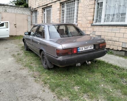 Серый Тойота Камри, объемом двигателя 2 л и пробегом 396 тыс. км за 1432 $, фото 1 на Automoto.ua