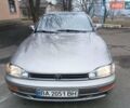 Серый Тойота Камри, объемом двигателя 3 л и пробегом 456 тыс. км за 3700 $, фото 1 на Automoto.ua