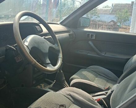Серый Тойота Камри, объемом двигателя 2 л и пробегом 450 тыс. км за 485 $, фото 1 на Automoto.ua