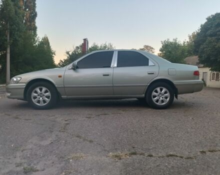 Сірий Тойота Камрі, об'ємом двигуна 3 л та пробігом 123 тис. км за 3799 $, фото 21 на Automoto.ua