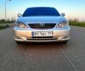 Серый Тойота Камри, объемом двигателя 3 л и пробегом 230 тыс. км за 6500 $, фото 1 на Automoto.ua