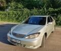 Сірий Тойота Камрі, об'ємом двигуна 3 л та пробігом 302 тис. км за 4850 $, фото 1 на Automoto.ua