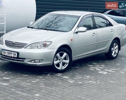 Сірий Тойота Камрі, об'ємом двигуна 2.4 л та пробігом 216 тис. км за 5999 $, фото 3 на Automoto.ua