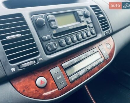 Сірий Тойота Камрі, об'ємом двигуна 2.4 л та пробігом 216 тис. км за 5999 $, фото 33 на Automoto.ua