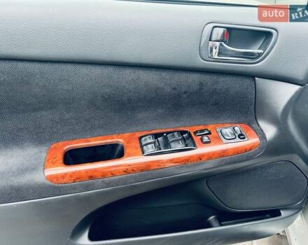 Сірий Тойота Камрі, об'ємом двигуна 2.4 л та пробігом 216 тис. км за 5999 $, фото 39 на Automoto.ua