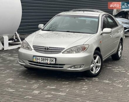 Сірий Тойота Камрі, об'ємом двигуна 2.4 л та пробігом 216 тис. км за 5999 $, фото 4 на Automoto.ua