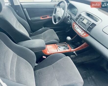 Сірий Тойота Камрі, об'ємом двигуна 2.4 л та пробігом 216 тис. км за 5999 $, фото 30 на Automoto.ua