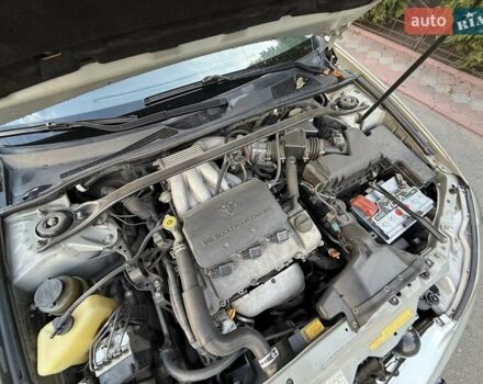 Сірий Тойота Камрі, об'ємом двигуна 3 л та пробігом 215 тис. км за 6800 $, фото 41 на Automoto.ua