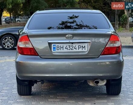 Серый Тойота Камри, объемом двигателя 2.4 л и пробегом 257 тыс. км за 5400 $, фото 59 на Automoto.ua