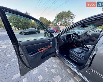 Серый Тойота Камри, объемом двигателя 2.4 л и пробегом 257 тыс. км за 5400 $, фото 51 на Automoto.ua