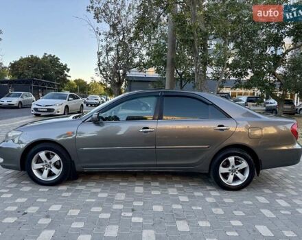 Серый Тойота Камри, объемом двигателя 2.4 л и пробегом 257 тыс. км за 5400 $, фото 63 на Automoto.ua