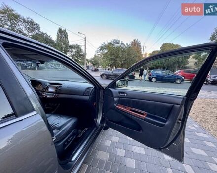 Серый Тойота Камри, объемом двигателя 2.4 л и пробегом 257 тыс. км за 5400 $, фото 38 на Automoto.ua