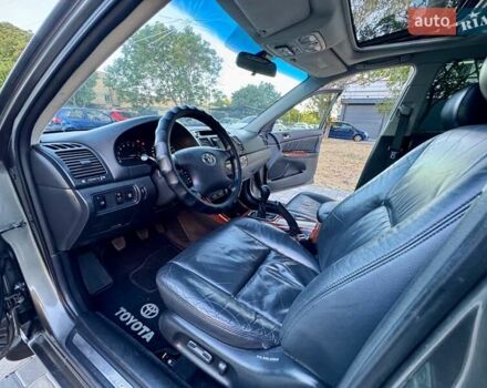 Серый Тойота Камри, объемом двигателя 2.4 л и пробегом 257 тыс. км за 5400 $, фото 44 на Automoto.ua