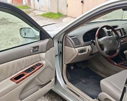 Серый Тойота Камри, объемом двигателя 2.36 л и пробегом 260 тыс. км за 6500 $, фото 6 на Automoto.ua
