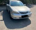 Сірий Тойота Камрі, об'ємом двигуна 2.4 л та пробігом 420 тис. км за 3500 $, фото 1 на Automoto.ua